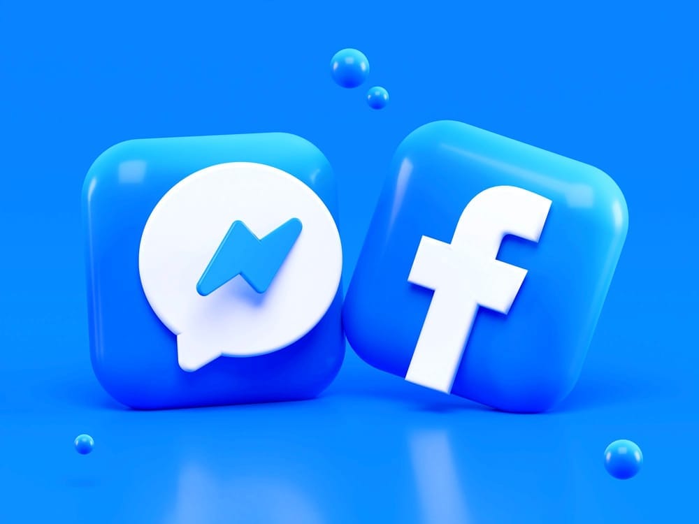 3D rendered logos for both Messenger and Facebook. Photo by Alexander Shatov / Unsplash.